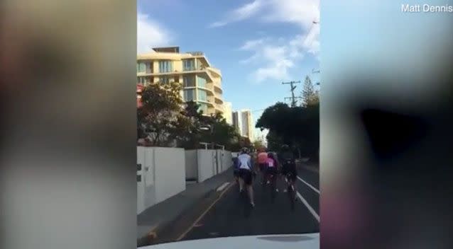 “You guys are deadest f***ing imbeciles aren’t you?” he says to the cyclists as he overtakes. Photo: Matt Dennis