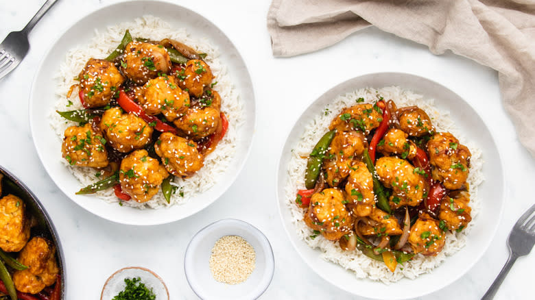 Two bowls of sesame cauliflower stir fry