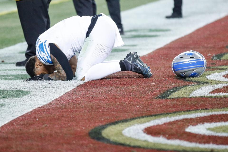 Detroit running back David Montgomery falls to the turf after the Lions' 34-31 loss to the 49ers in the NFC championship game.