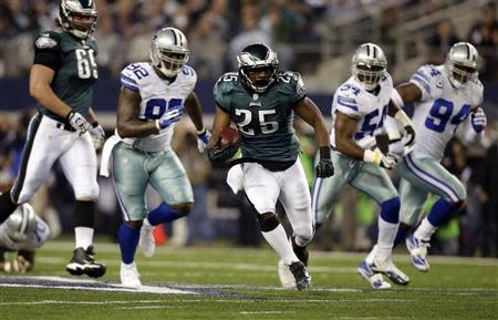 Dec 29, 2013; Arlington, TX, USA; Philadelphia Eagles running back LeSean McCoy (25) runs with the ball in the first quarter against the Dallas Cowboys at AT&T Stadium. Mandatory Credit: Tim Heitman-USA TODAY Sports