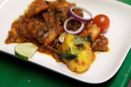 'Palani Potatoes' sit on a plate after being cooked at the City Spice curry house on Brick Lane in London, Britain January 7, 2019. Picture taken January 7, 2019. REUTERS/Simon Dawson