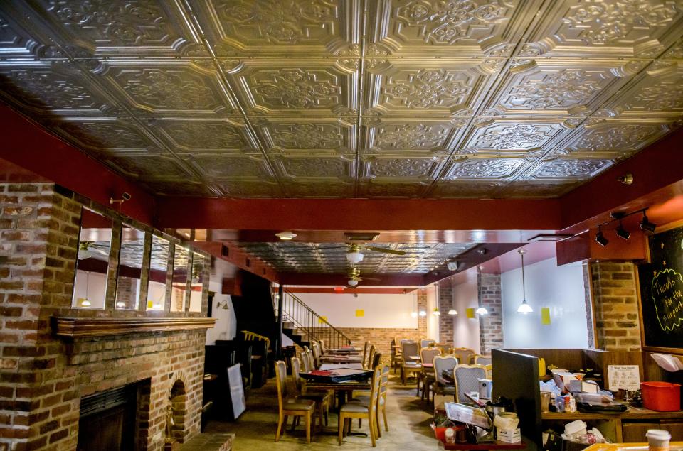 The tin ceiling that extends through the dining room will remain at the former Richard's on Main, soon to become Richard's Under Main, in downtown Peoria.