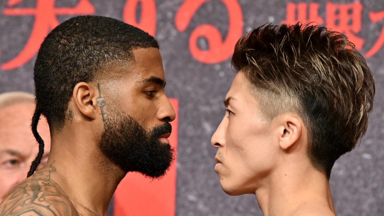  WBC and WBO super bantamweight champion Stephen Fulton (L) of the US and Japanese challenger Naoya Inoue face off during the official weigh-in at a hotel in Yokohama, Kanagawa prefecture on July 24, 2023, ahead of their title match at Tokyo's Ariake Arena on July 2 