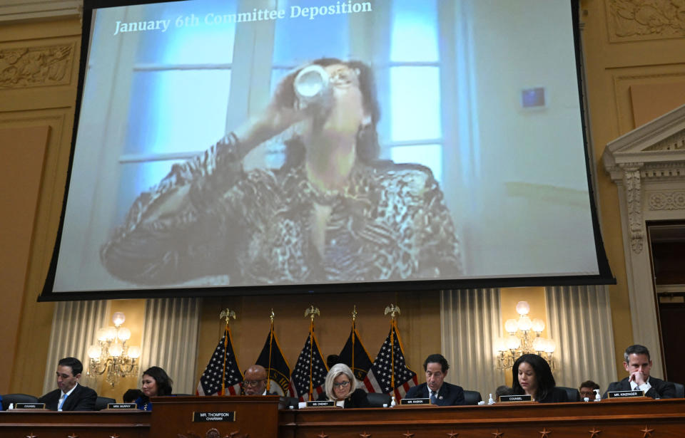 Lawyer Sidney Powell takes a drink from a can of Diet Dr Pepper during her video deposition on Capitol Hill on July 12, 2022, in Washington, D.C. (Saul Loeb / AFP / Getty Images)