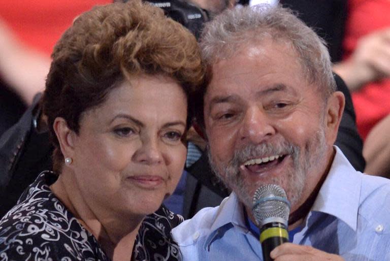 Brazilian President Dilma Rousseff (L) and former president Luiz Inacio Lula da Silva attend a campaign rally in Sao Paulo, Brazil, on October 20. 2014