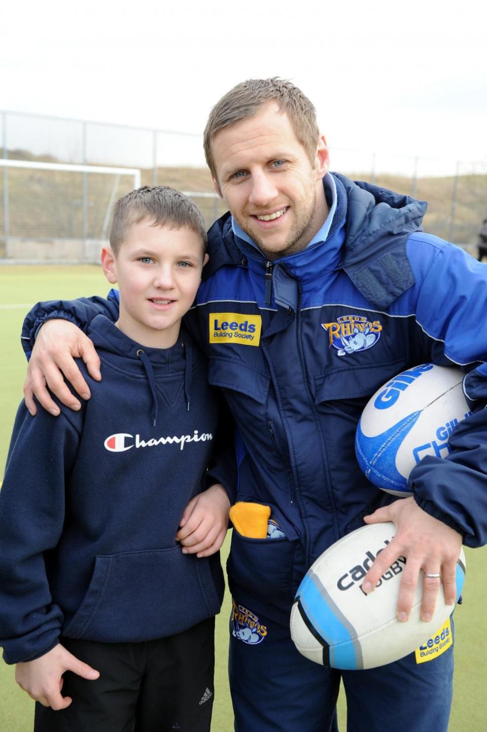 News and Star:  Liam Williamson (10)from Salterbeck meets his hero Rob Burrow back in 2010.