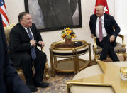 U.S. Secretary of State Mike Pompeo, left, with Turkish Foreign Minister Mevlut Cavusoglu before their official talks in Ankara, Turkey, October 17, 2018. On Wednesday a pro-government Turkish newspaper published a report made from what they described as an audio recording of Saudi writer and journalist Jamal Khashoggi's alleged torture and slaying at the Saudi Consulate in Istanbul. (Leah Millis/Pool via AP)