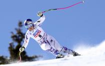 United States' Lindsey Vonn speeds down the course during an alpine ski, women's World Cup super-G in Cortina D'Ampezzo, Italy, Sunday, Jan. 20, 2019. (AP Photo/Marco Trovati)