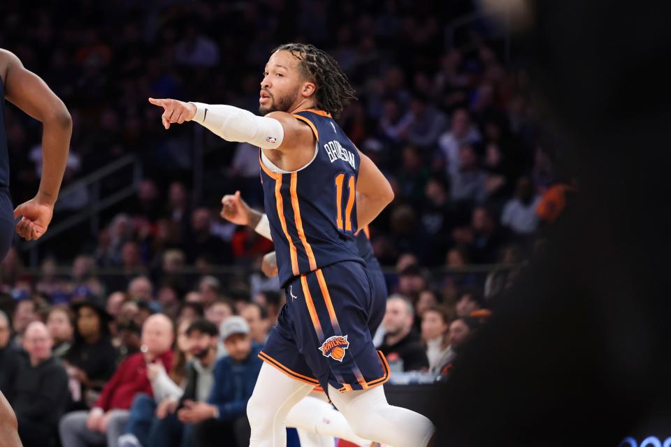 New York Knicks guard Jalen Brunson (11) gestures during the first half of an NBA basketball game against the Phoenix Suns, Monday, Jan. 2, 2023, in New York.