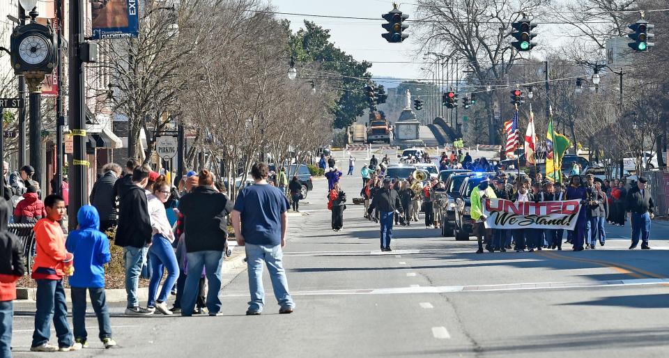 The GROW Gadsden master plan calls for redesigning Broad Street's streetscape to reinforce downtown as an active destination that can serve as the economic engine and cultural heart of the city. People crowd Broad Street in downtown Gadsden for the Unity in the Community/MLK Day Parade on Jan. 25, 2019.