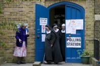 Nuns leave a polling station after voting in London on May 7, 2015 as Britain holds a general election