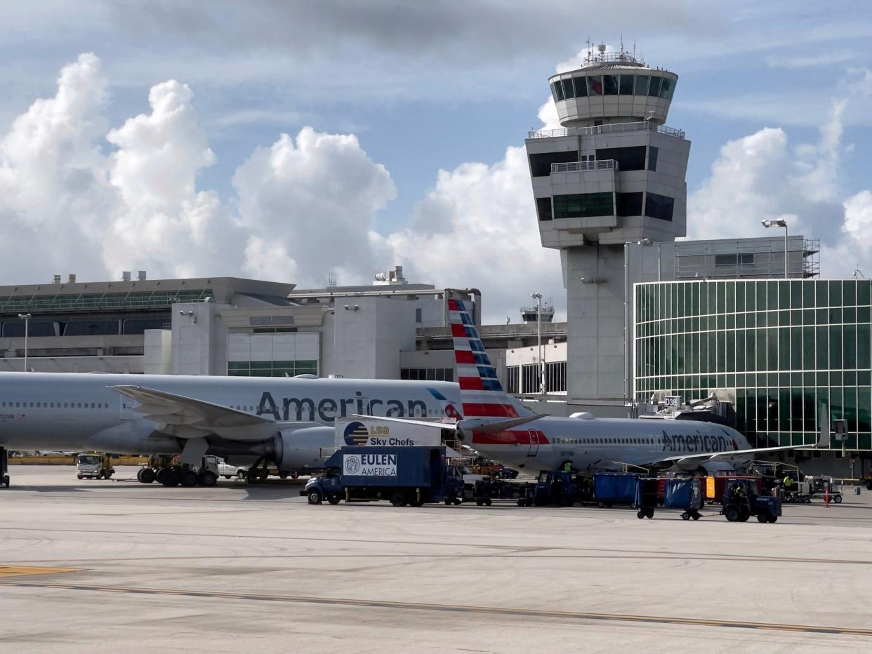 American Airlines planes are seen at the gates at Miami International Airport