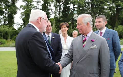 The Prince of Wales meeting Sinn Fein's Martin Ferris at a Garden Party at Killarney House - Credit: Niall Carson/PA