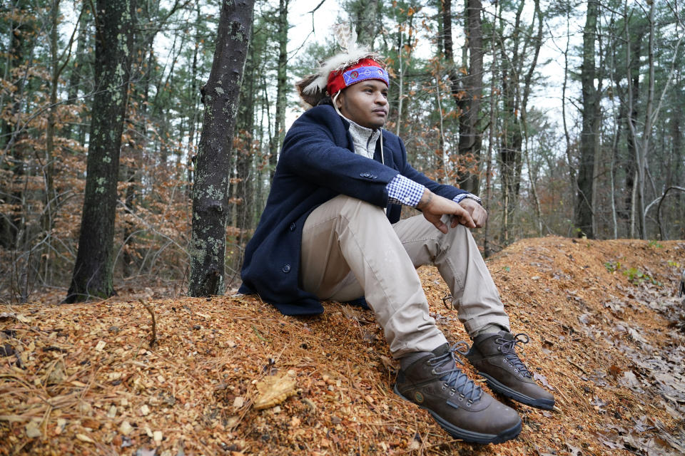 Larry Fisher, chief sachem of the Mattakeeset Massachuset tribe, sits for a photo at Titicut Indian Reservation, Friday, Nov. 27, 2020, in Bridgewater, Mass. A rift has been widening between Native American groups in New England over a federal reservation south of Boston where one tribe is planning to build a $1 billion casino. The Mattakeeset Massachuset tribe contend the Mashpee Wampanoag tribe doesn't have exclusive claim to the lands under their planned First Light casino in the city of Taunton, as they've argued for years. (AP Photo/Elise Amendola)