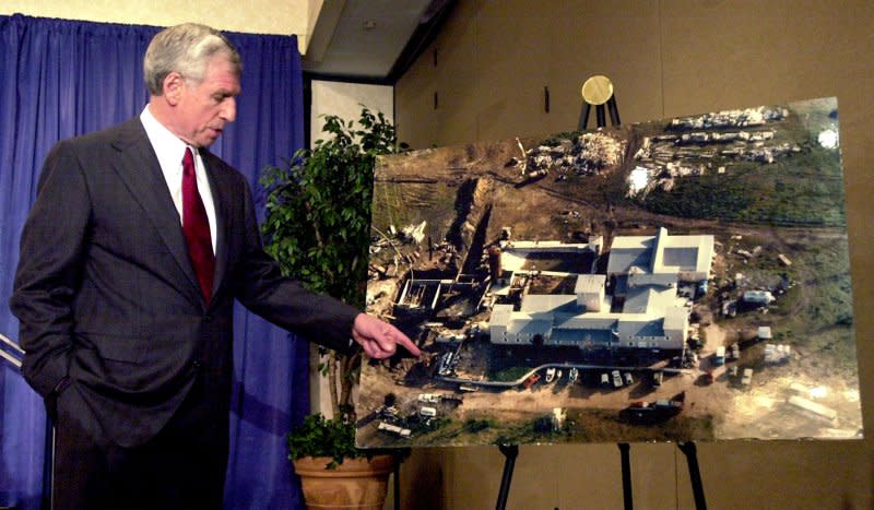 Special counsel and former U.S. Sen. John C. Danforth points to where shell casings were found at the Branch Davidian compound, in Waco, Texas, during a news conference to discuss his findings from the 1993 confrontation on July 21, 2000, in St. Louis. On February 26, 1994, 11 members of the Branch Davidian religious cult were acquitted of murder and conspiracy charges stemming from the siege. File Photo by Bill Greenblatt/UPI