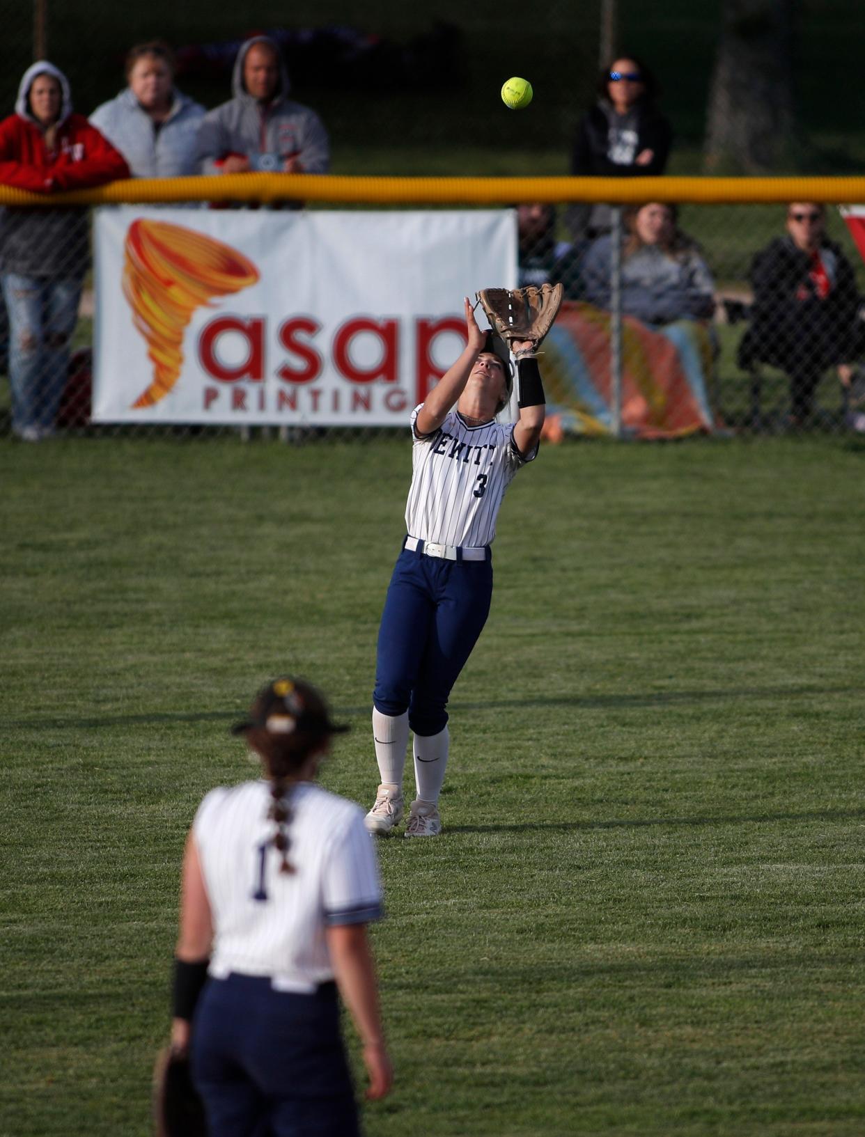 DeWitt's Natalie Donaldson catches a fly ball against Laingsburg during the Greater Lansing Area Sports Hall of Fame Softball Classic, Wednesday, May 24, 2023, at Ranney Park.