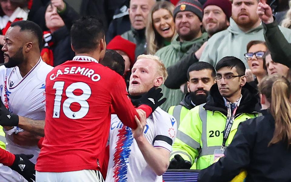 Casemiro of Manchester United clashes with Will Hughes of Crystal Palace leading to a red card decision during the Premier League match between Manchester United and Crystal Palace at Old Trafford -Manchester United vs Leeds live: score and latest updates from the Premier League - Alex Livesey/Getty Images