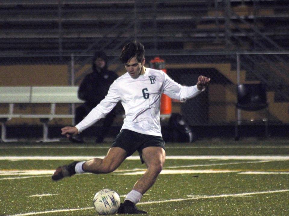 Fleming Island midfielder Daniel Vizcarrondo (6) takes a shot on goal during a January soccer game.