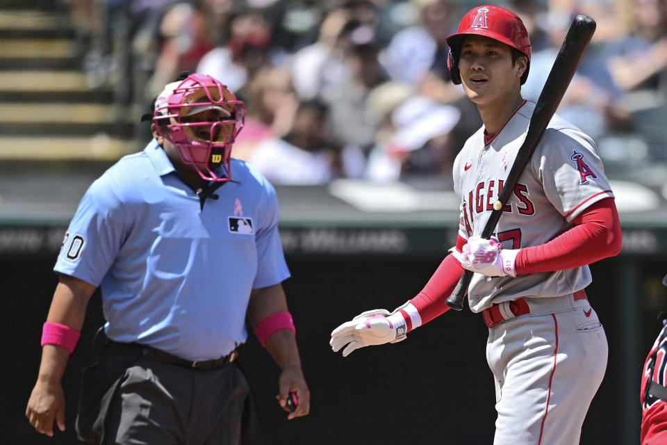 Los Angeles Angels' Shohei Ohtani reacts after striking out during the fourth inning of a baseball game against the Cleveland Guardians, Sunday, May 14, 2023, in Cleveland. (AP Photo/David Dermer)