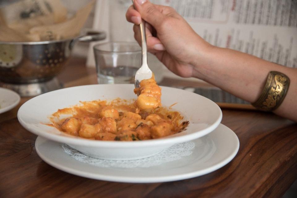 A belly-warming dish of gnocchi is served at Lynora's, a local mini-chain of family-owned restaurants.