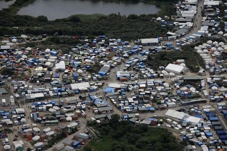 An aerial view of a makeshift camp where migrants live in what is known as the "Jungle", a sprawling camp in Calais, France, August 14, 2016. REUTERS/Pascal Rossignol