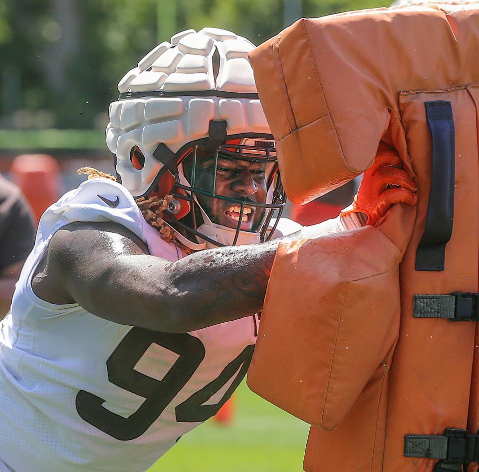 Cleveland Browns defensive rookie end Alex Wright works the sled during training camp on Friday, July 29, 2022 in Berea.