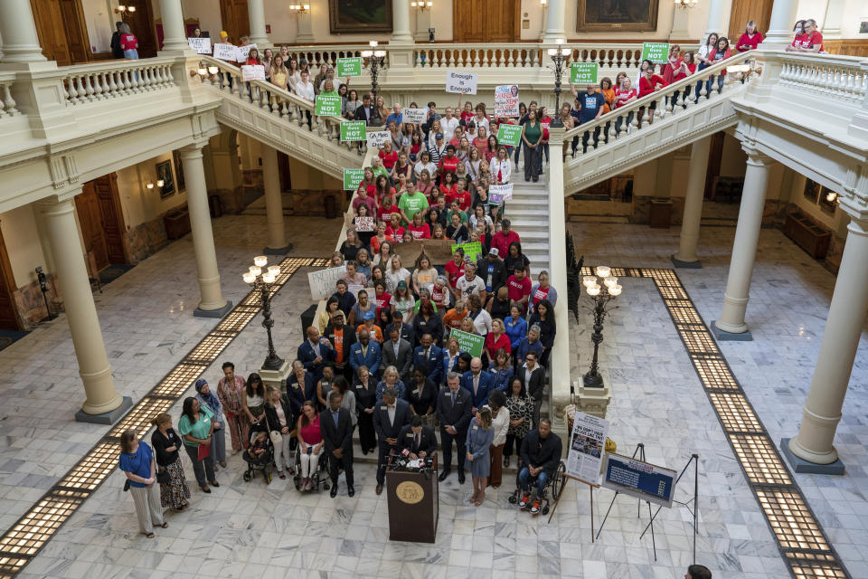 Georgia Democrats stand on the South Steps of the Capitol calling for a special session to address gun violence, Wednesday, May 10, 2023, in Atlanta. (Matthew Pearson/WABE via AP)