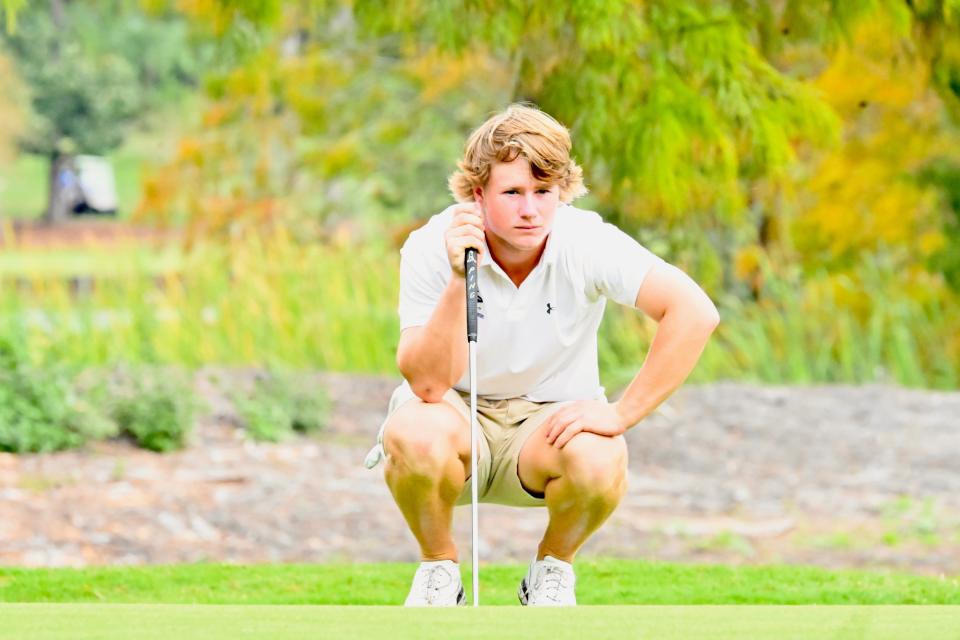 Brock Blais looks over a putt during a Ponte Vedra High tournament last fall.