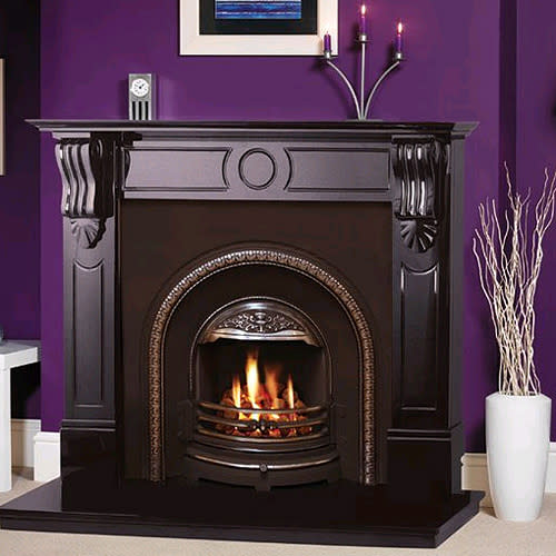 <b>Aurora Taurus Fireplace</b><br><br>Reminiscent of late Victorian design with its bevelled-edge mantel shelf, this striking black fireplace is the perfect way to make a striking statement in a traditional home. <br><br> £1,170, <b><a href="http://www.fireplaceworld.co.uk/package/6564/Aurora-Taurus-Fire-Surround-with-Black-Granite-Hearth-and-Cast-Back#.UNQ5pXewZ8F" rel="nofollow noopener" target="_blank" data-ylk="slk:Fireplace World;elm:context_link;itc:0;sec:content-canvas" class="link ">Fireplace World<br></a></b>