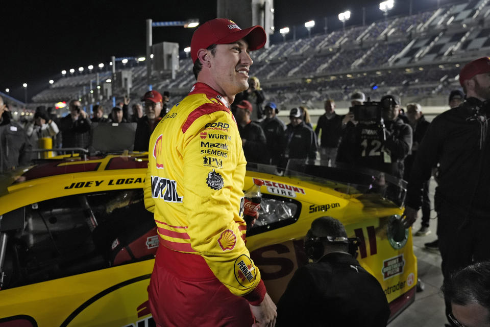 Joey Logano reacts after taking the pole position during qualifying for the NASCAR Daytona 500 auto race Wednesday, Feb. 14, 2024, at Daytona International Speedway in Daytona Beach, Fla. (AP Photo/Chris O'Meara)