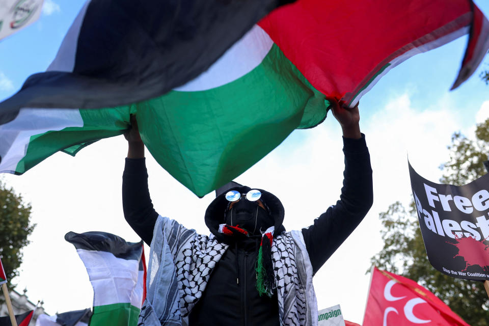 A demonstrator attends a protest in solidarity with Palestinians, amid the ongoing conflict between Israel and the Palestinian Islamist group Hamas, in London, Britain, October 14, 2023. REUTERS/Susannah Ireland