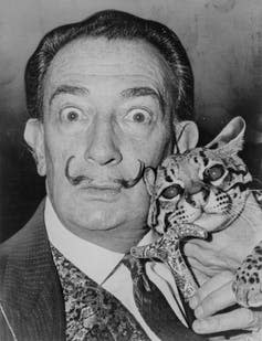 <span class="caption">Salvador Dalí with his pet ocelot Babou.</span> <span class="attribution"><span class="source">United States Library of Congress</span></span>