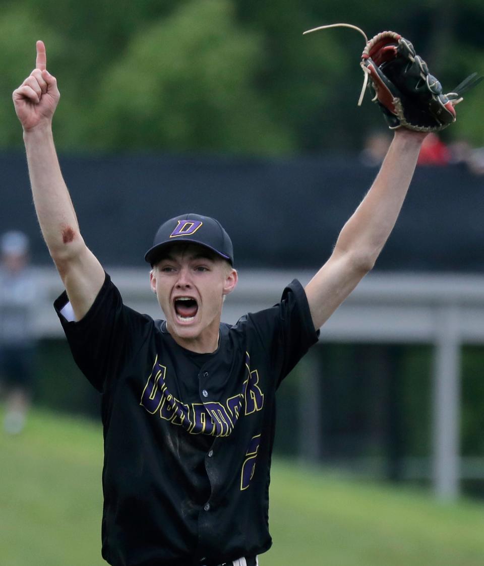 Denmark pitcher Jaycob Dittmer (2) reacts to the team's win over St. Thomas More in the WIAA Division 2 state title game at Fox Cities Stadium last June.