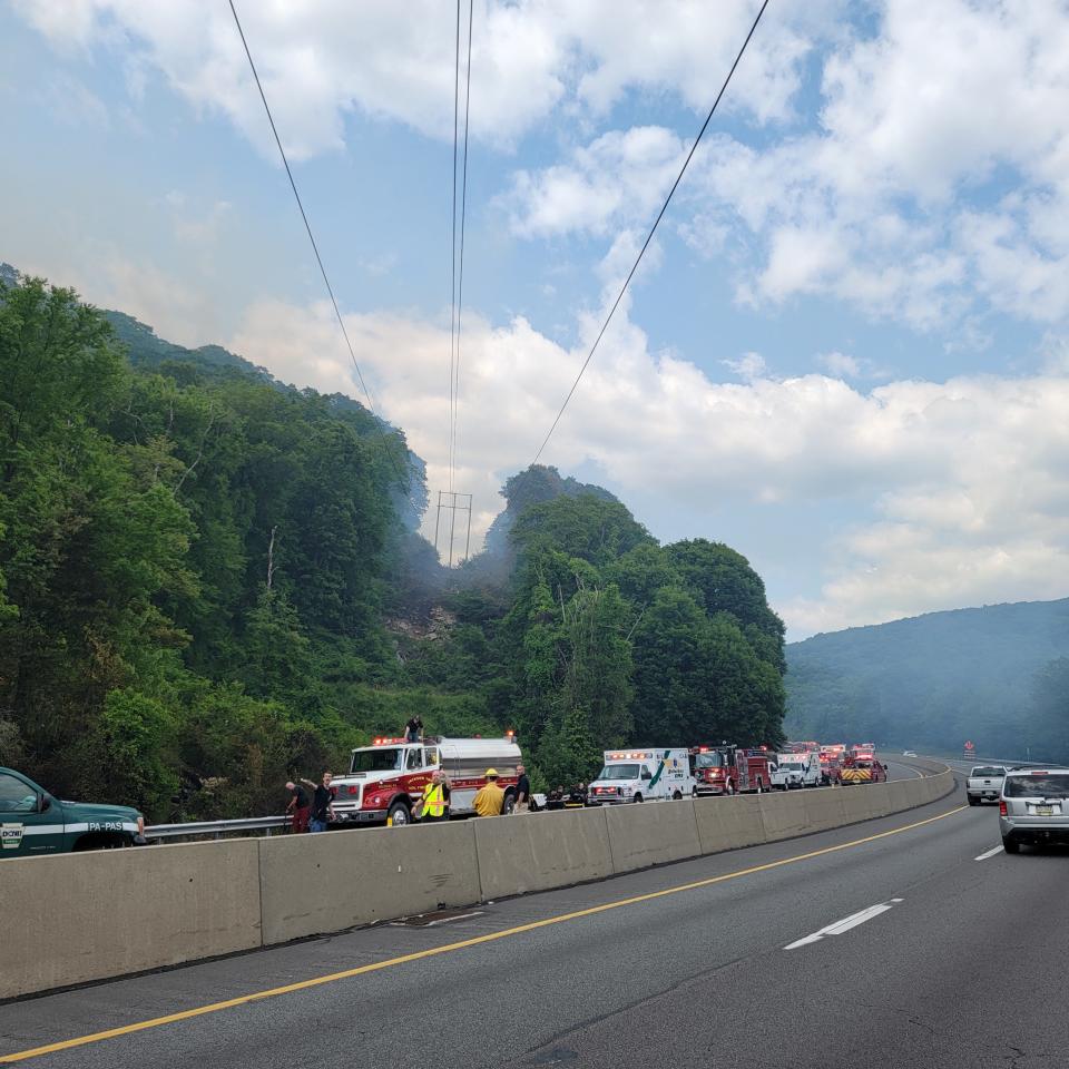 Over 30 fire responder vehicles lined up along Southbound Route 33 near the Monroe/Northampton County line in response to brush fire around mile marker 17 on Monday, June 5, 2023.