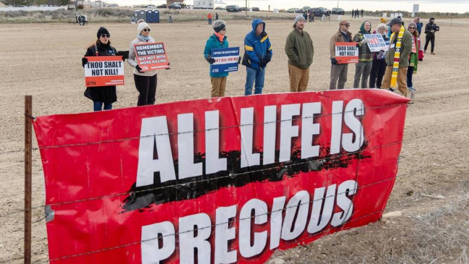 Protesters gather Wednesday outside of the Idaho Maximum Security Institution in Kuna to protest the death penalty.