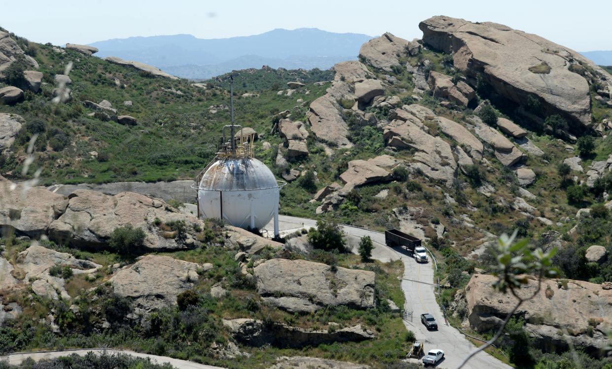 A hydrogen sphere rises from the rocky landscape at the Santa Susana Field Laboratory in the Simi Hills.