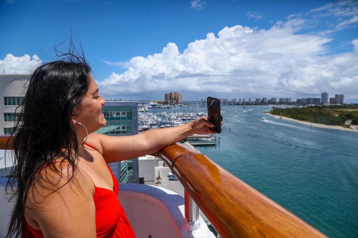 Orlando resident Sheila Schaefer takes a selfie on the Margaritaville at Sea Paradise May 12, 2022. The Port of Palm Beach’s Bahamas Cruise Line returns to the seas with its first trip in more than two years. The ship will carry passengers from the Port of Palm Beach to Freeport, Grand Bahama Island. 