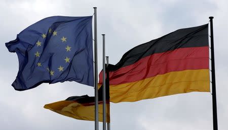 The European Union and German nation flags are pictured before a debate on the consequences of the Brexit vote at the lower house of parliament Bundestag in Berlin, Germany, June 28, 2016. REUTERS/Fabrizio Bensch