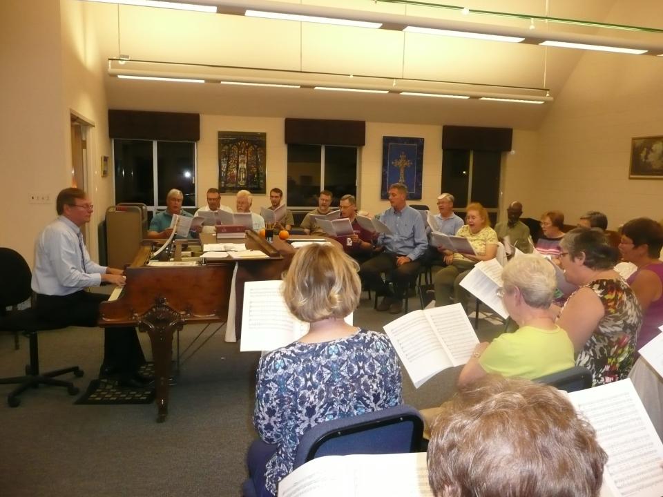 Steve Lange works with adult choir at St. Paul's Episcopal Church in Lansing in 2015.