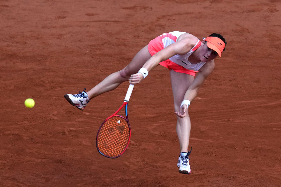 Slovenia's Tamara Zidansek serves to Spain's Paula Badosa during their quarterfinal match of the French Open tennis tournament at the Roland Garros stadium in Paris, Tuesday, June 8, 2021. (AP Photo/Christophe Ena)