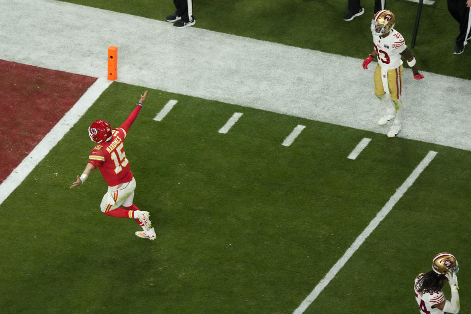Kansas City Chiefs quarterback Patrick Mahomes (15) celebrates after throwing the game-winning touchdown pass to wide receiver Mecole Hardman Jr. during the overtime of the NFL Super Bowl 58 football game against the San Francisco 49ers Sunday, Feb. 11, 2024, in Las Vegas. (AP Photo/David J. Phillip)