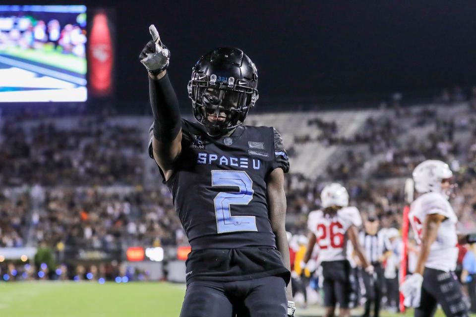 UCF Knights wide receiver Kobe Hudson (2) celebrates after scoring during the second quarter Thursday, Oct. 13, 2022, against the Temple Owls at FBC Mortgage Stadium in Orlando, Florida.