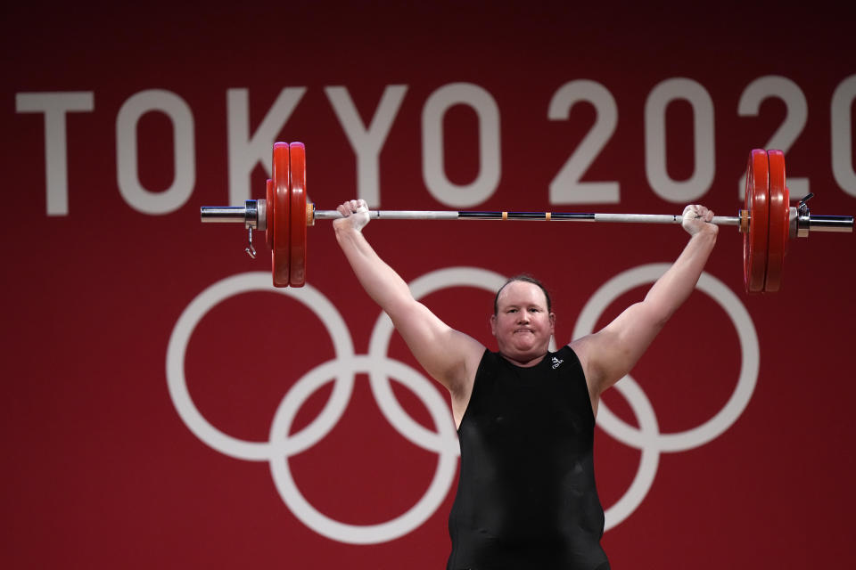 Laurel Hubbard of New Zealand competes in the women's +87kg weightlifting event at the 2020 Summer Olympics, Monday, Aug. 2, 2021, in Tokyo, Japan. (AP Photo/Luca Bruno)