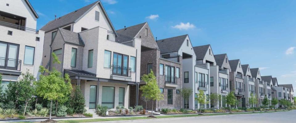 Brand new row of three story single family houses in Richardson, North Dallas location.