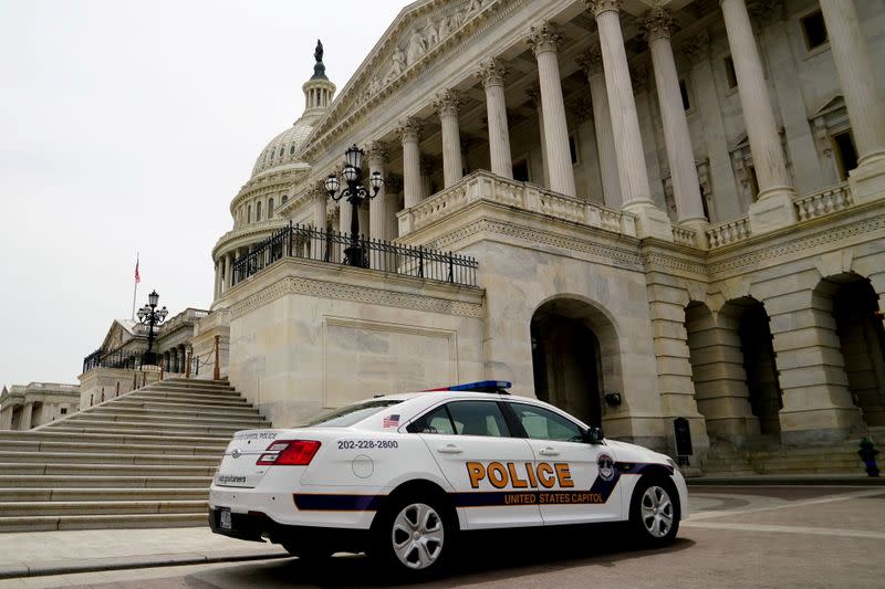 FILE PHOTO: A Capitol Police vehicle parks at the U.S. Capitol in Washington