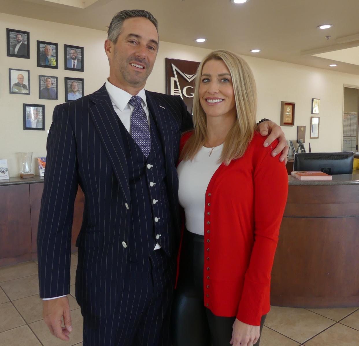 David Greiner, the owner/president of Greiner Buick GMC, and his soulmate, Missy Miranda, at the dealership in Victorville. Greiner said he sold the 35-year-old family business to Caposio Buick GMC.