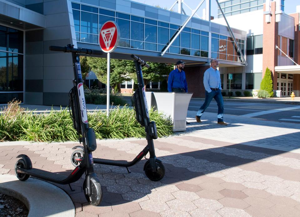 GOAT scooters are placed outside of the DoubleTree by Hilton hotel in Downtown Evansville, Ind., Thursday afternoon, Oct. 17, 2019. 