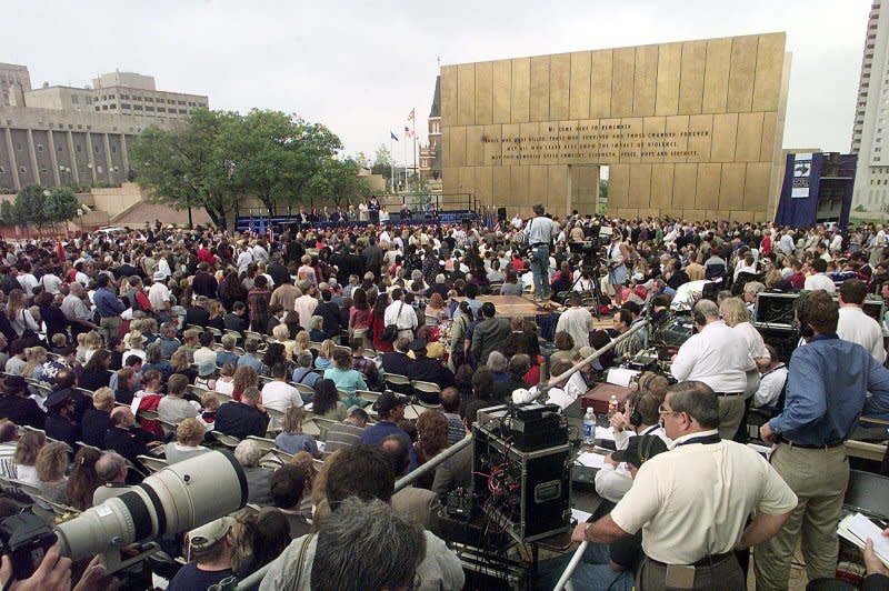 Families of survivors and rescue workers attend opening of the Oklahoma City bombing memorial April 19, 2000. File Photo by Bill Carter/UPI