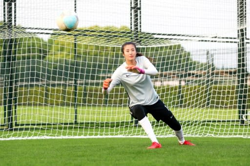 China's goalkeeper Zhao Lina is put through her paces at a training session in Shanghai