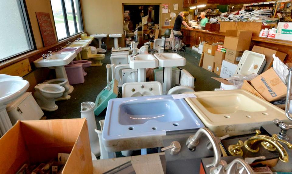 Graham’s showroom floor is a sea of dozens of white and pastel-colored sinks and toilet bowls that rest on the carpet with no price tags attached. Some are for sale, some are waiting to be picked up, some are projects in progress.